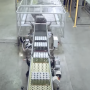 Pegasus beverage filling machine with example cans